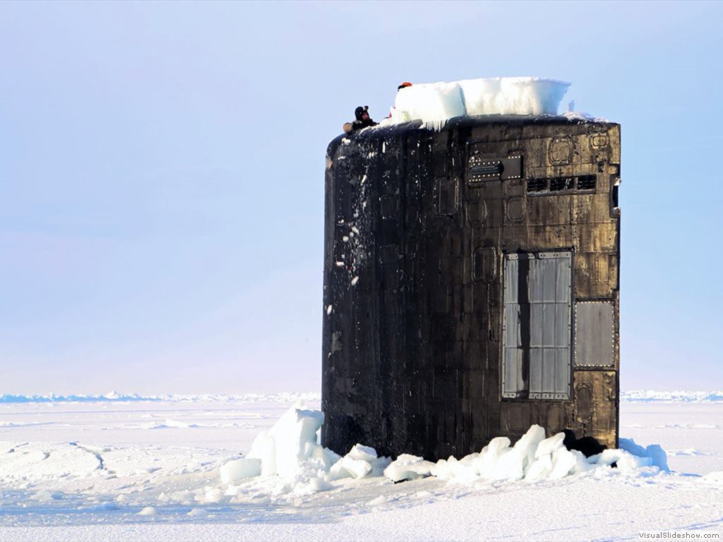 USS Hampton (SSN-767) pokes through a large sheet of drift ice in the Arctic March, 2014